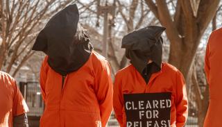 Protesters outside the White House on the 20th anniversary of Guantanamo Bay