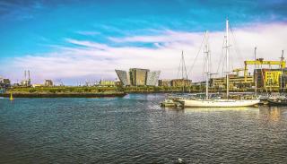 Sailboat in shipyard near Titantic building, Belfast