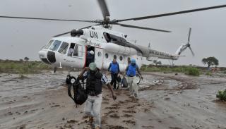 A helicopter with UN officials in front