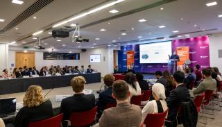 Students listening to David Gunn's keynote speech at the BISA climate simulation event 2024 at Chatham House