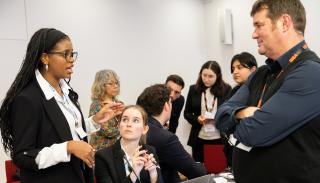 Several politics and IR students taking part in the BISA climate simulation event at Chatham House