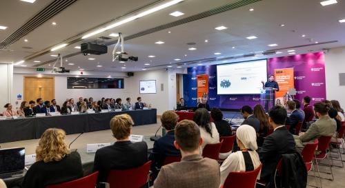 Students listening to David Gunn's keynote speech at the BISA climate simulation event 2024 at Chatham House