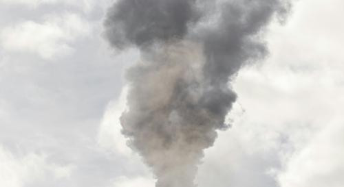 factory emitting smoke from the top