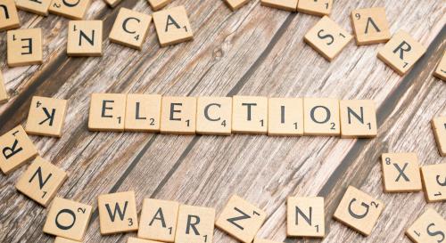 Scrabble letters arrange to make the word 'election'