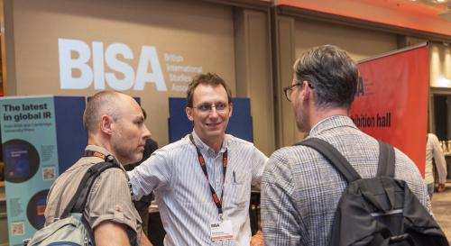 Andrew Dorman speaking with two #BISA2023 delegates at Hilton Glasgow